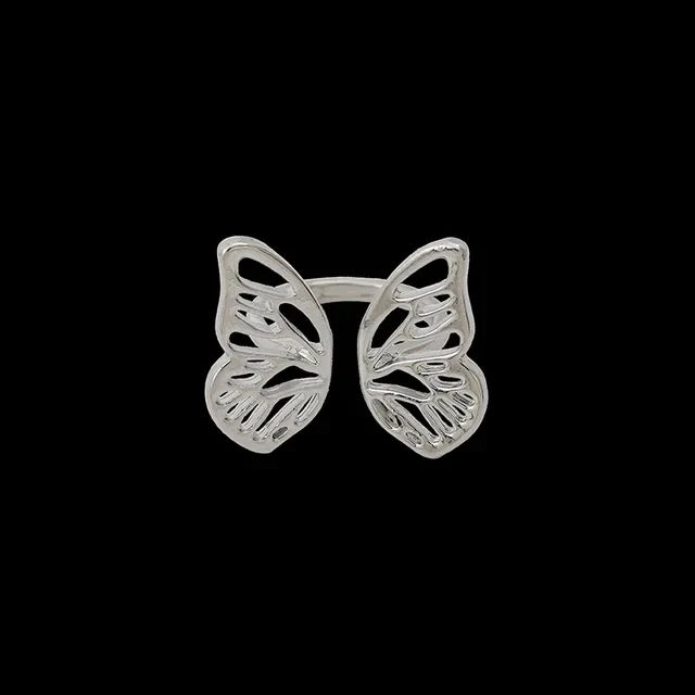 Anneau De Foulard papillon ajouré argenté