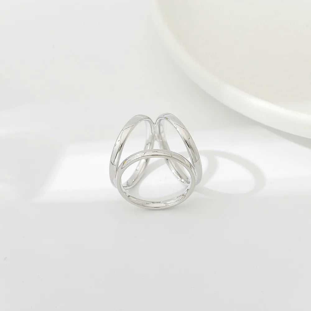 Anneau De Foulard argent croisé ajouré en triple anneaux